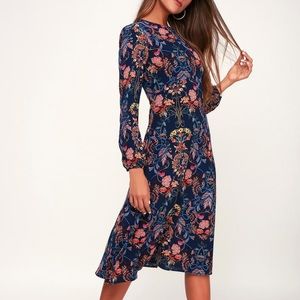 Long sleeve midi floral dress. Never worn!